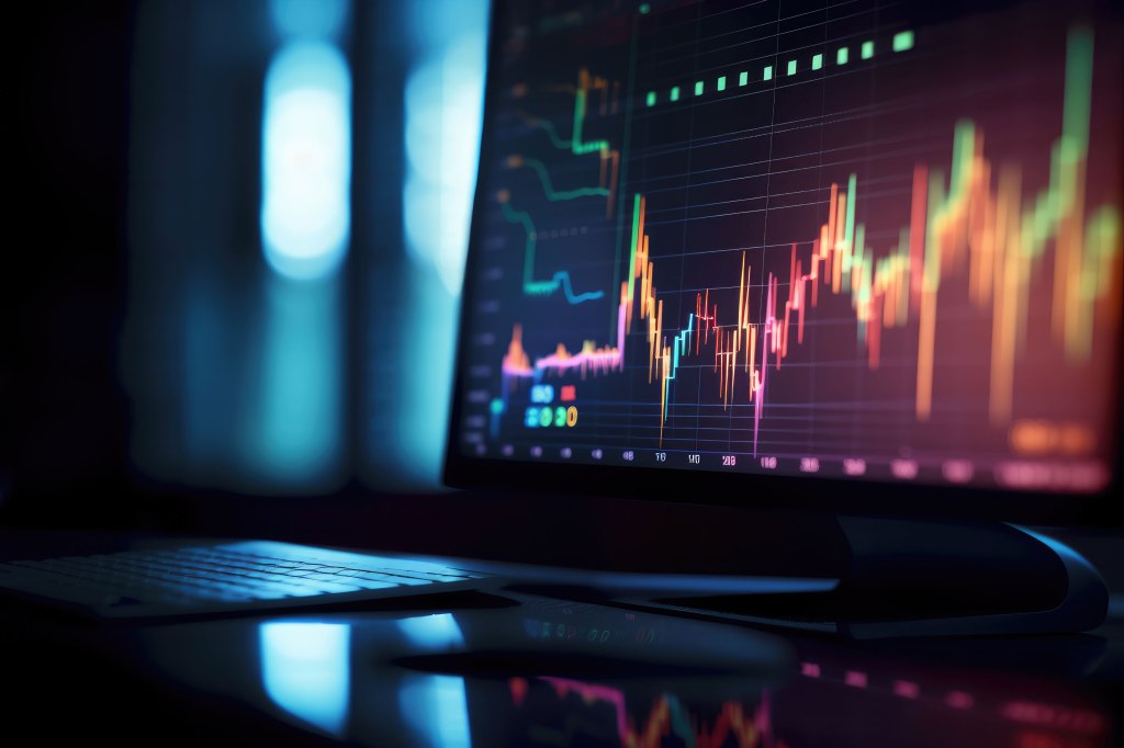 Close-up of laptop displaying financial performance data