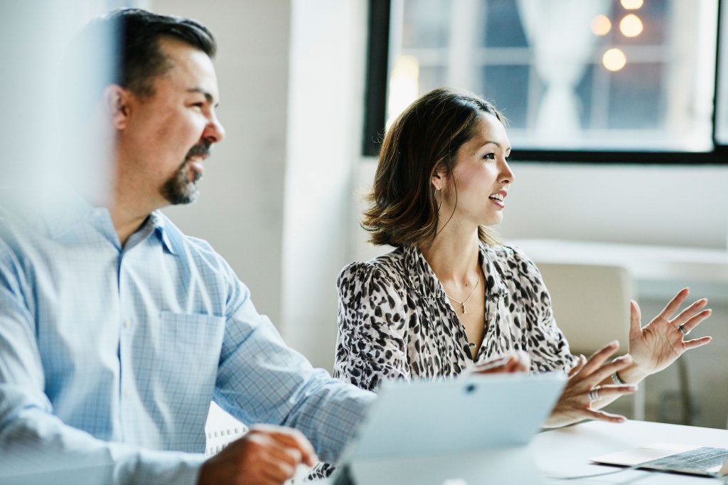 Wealth Management clients talking to their advisor