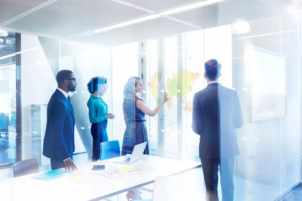 Business people discussing outsorced trading